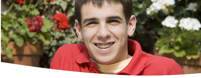 Teen with braces, smiling